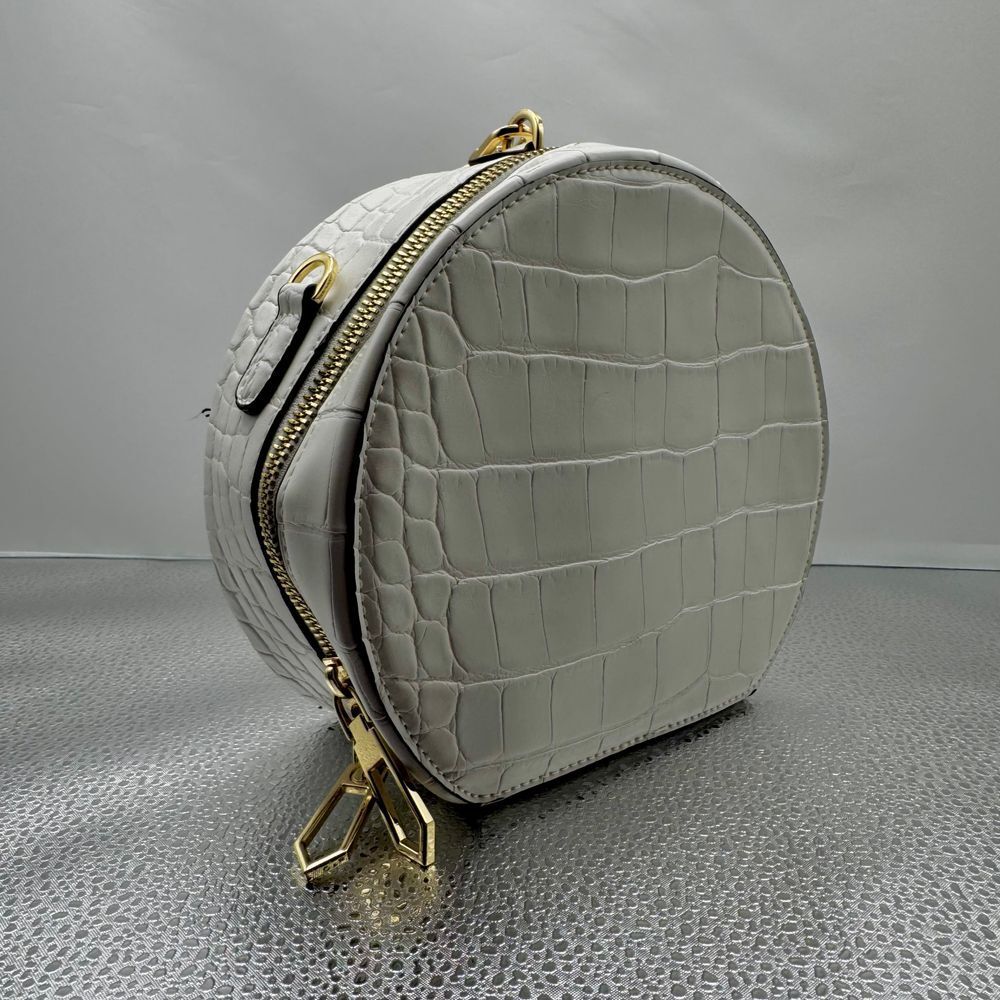Gianni Bini, round white croc‎ leather wrist strap; missing longer strap, gold